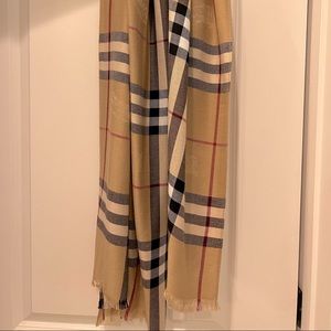 Authentic Burberry scarf. Only worn once. Tag included with the scarf.